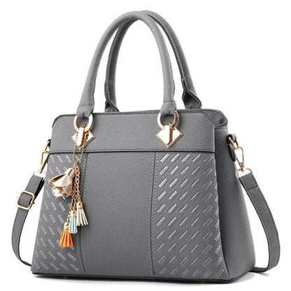 Bolso gris de mujer